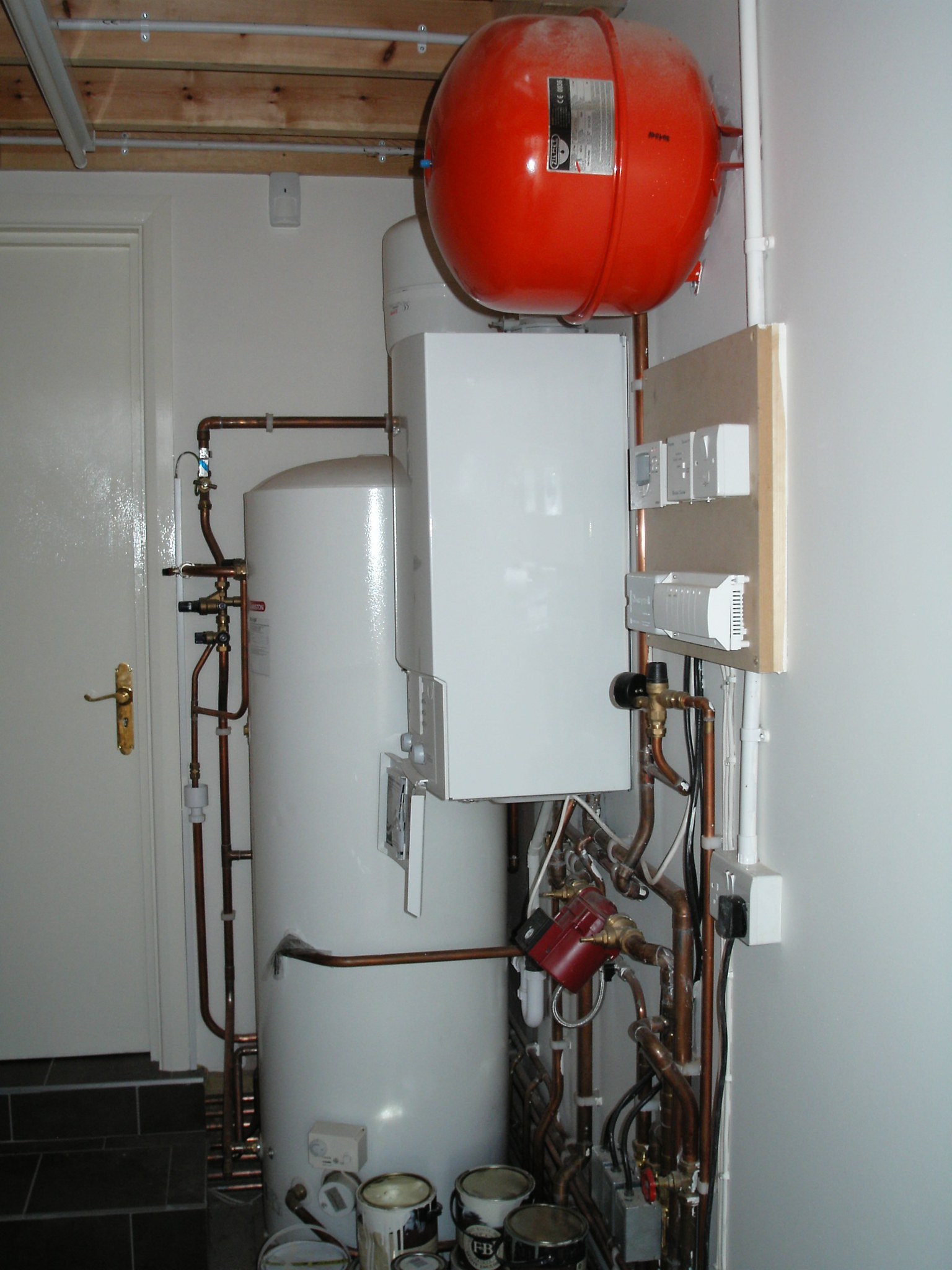 An unvented cylinder with its expansion vessel and neat pipework